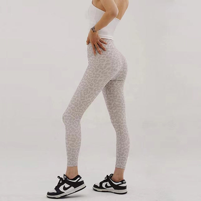 Yoga clothes women's sports fitness trousers leopard print quick-drying tight high waist nude sense cropped jogging training European and American