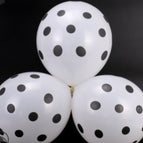 White ball black dot