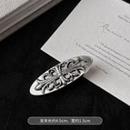 An oval cross edge clip