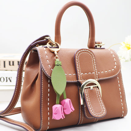 Little red book with tulip keychain cute personality car key bag pendant can be printed logo factory direct sales