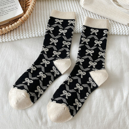 Zhuji socks women's autumn and winter retro trend women's socks bow printed socks warm cold-resistant pile socks wholesale