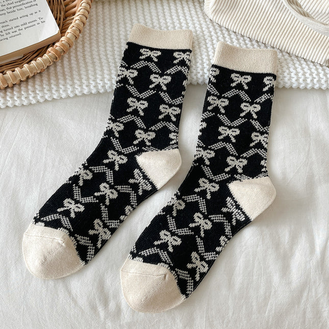 Zhuji socks women's autumn and winter retro trend women's socks bow printed socks warm cold-resistant pile socks wholesale