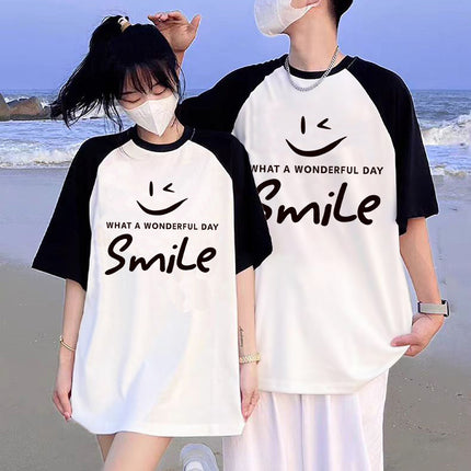 New top girls' contrast color design color matching loose short sleeve black and white color separation smiley face printed casual T-shirt women's clothing