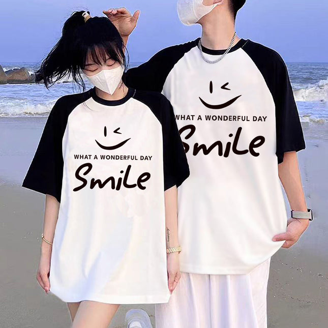 New top girls' contrast color design color matching loose short sleeve black and white color separation smiley face printed casual T-shirt women's clothing