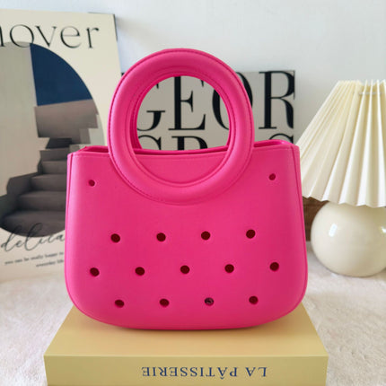 Cross-border new ladies handbag cartoon love fashion round travel storage bag eva hole bag beach bag
