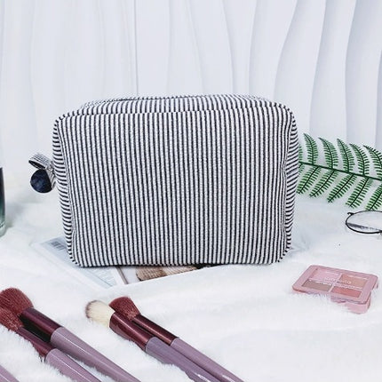 etsy hot selling seersucker embroidered striped cosmetic bag for travel portable toilet storage cosmetic bag