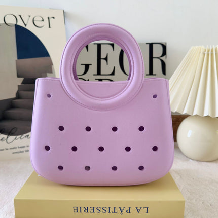 Cross-border new ladies handbag cartoon love fashion round travel storage bag eva hole bag beach bag