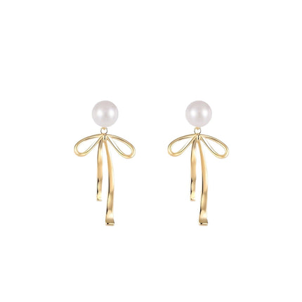 925 Silver Needle Korean and Japanese Summer Faux Pearl Bowknot Earrings Simple French Style Versatile 2026 New Women's Earrings