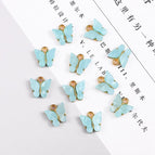 Length 13mm width 12.5mm aperture about 2mm 4/bag / Light blue