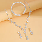 Silver three-piece necklace, earrings and bracelets set