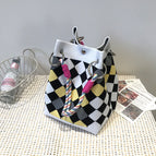 Black, gray and yellow small diamond-shaped handbag