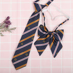 Dark blue and white M (tie collar flower)