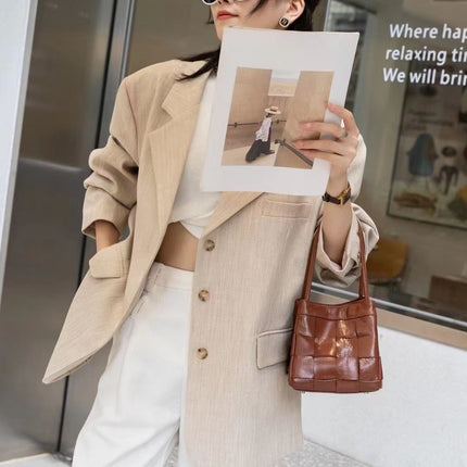 Summer textured leather woven bucket bag fashionable fashionable wings closed-toe layer cowhide mini women's bag underarm bag