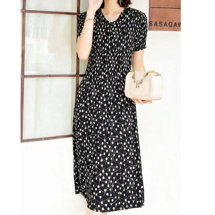 Miyake pleated 2025 summer new temperament round neck printed pleated skirt fashion waist thin magic dress