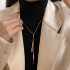 Rose gold triangular titanium steel necklace