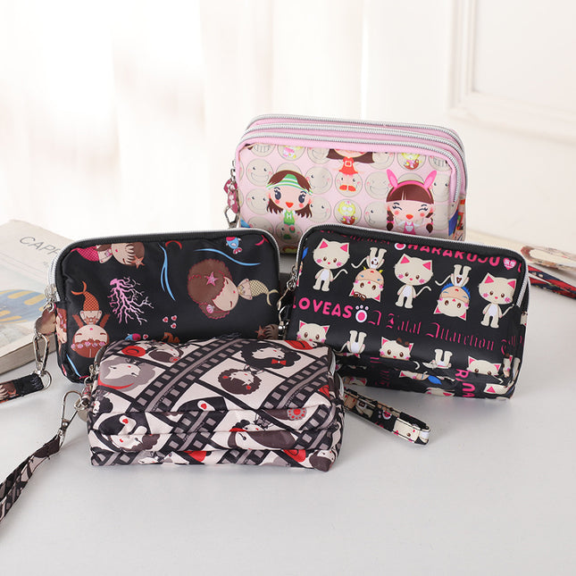 Mobile phone coin purse hand-held mini canvas bag women's bag Oxford cloth cartoon fabric bag wholesale