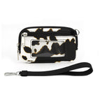 Black and white brown cow