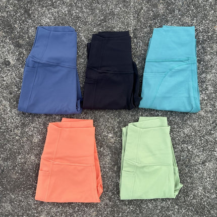 Solid color high luxury brushed Lycra fitness leggings cross-border European and American high waist peach hip yoga pants side pocket women