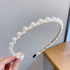 11#Big pearls and three small beads