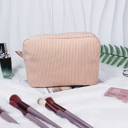etsy hot selling seersucker embroidered striped cosmetic bag for travel portable toilet storage cosmetic bag