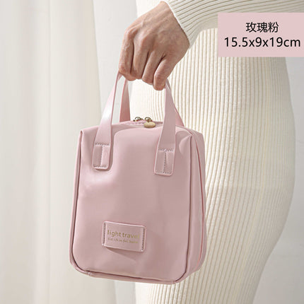 Travel portable cosmetic bag large capacity high-end feeling ins style high-value shell portable storage bag a batch