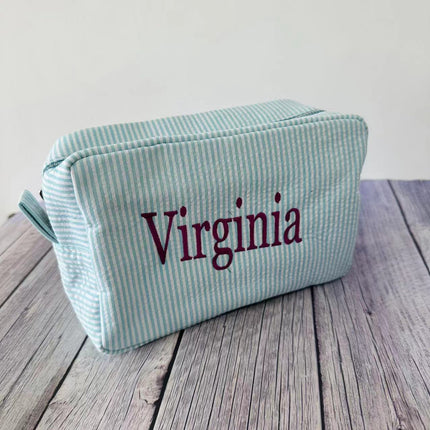 etsy hot selling seersucker embroidered striped cosmetic bag for travel portable toilet storage cosmetic bag
