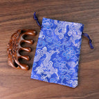 Lotus Fish Massage Comb Blue Silk Bag