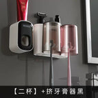 2 cups black and white toothpaste squeezer