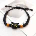 Yellow eyes black cat head braided black bracelet