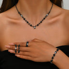 425747+424-2 rows of rings black (necklace + earrings + bracelet + ring)
