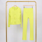 Fluorescent green hooded jacket and bell-bottom pants suit / 2/S