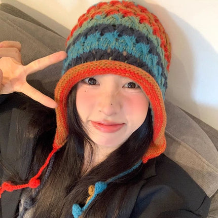 Colorful woven wool hat women's Korean-style all-match fashionable toe cap hollow earmuffs tassel ball knitted hat