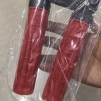 red pair of lock rings black