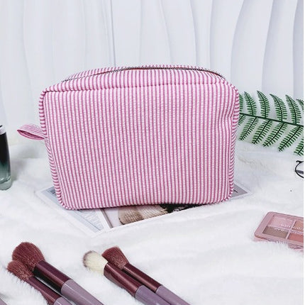 etsy hot selling seersucker embroidered striped cosmetic bag for travel portable toilet storage cosmetic bag