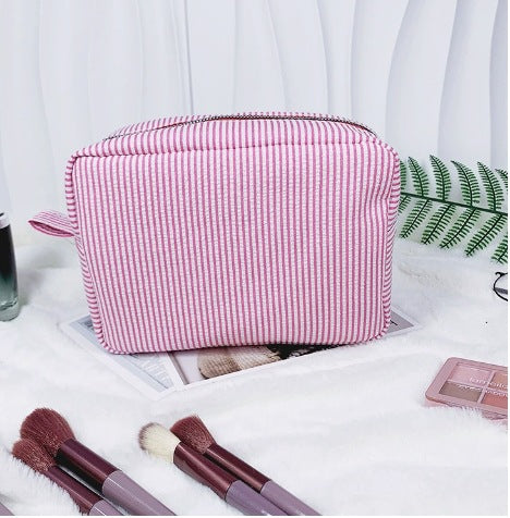 etsy hot selling seersucker embroidered striped cosmetic bag for travel portable toilet storage cosmetic bag