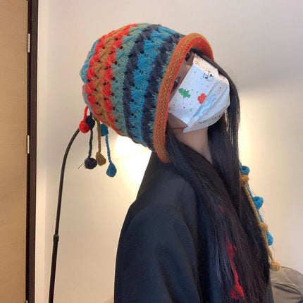 Colorful woven wool hat women's Korean-style all-match fashionable toe cap hollow earmuffs tassel ball knitted hat