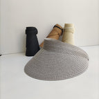 Light gray large brim empty top straw hat