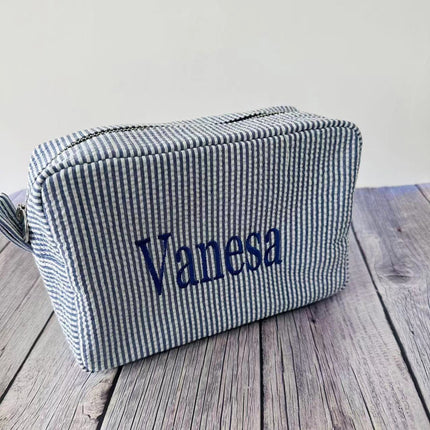 etsy hot selling seersucker embroidered striped cosmetic bag for travel portable toilet storage cosmetic bag