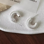 Threaded semi-circular stud earrings