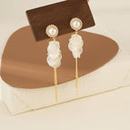 【1986】pearl disc tassel earrings