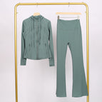Mysterious green hooded jacket and bell-bottom pants suit / 2/S