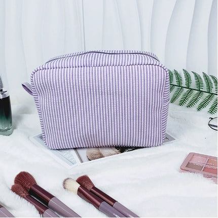 etsy hot selling seersucker embroidered striped cosmetic bag for travel portable toilet storage cosmetic bag