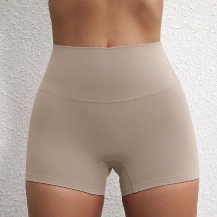 Summer solid color European and American women's high waist hip lifting peach sports shorts tight stretch fitness three pants can be worn outside