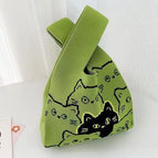 Multi-faced cat green