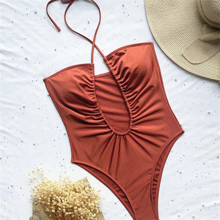 2023 new European and American cross-border solid color bikini strap bikini personality backless sexy one-piece swimsuit women