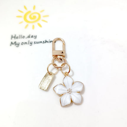 New Cross-border Ins Metal Daisy Keychain Niche Flower Stamen Bluetooth Headset Protective Cover Accessories