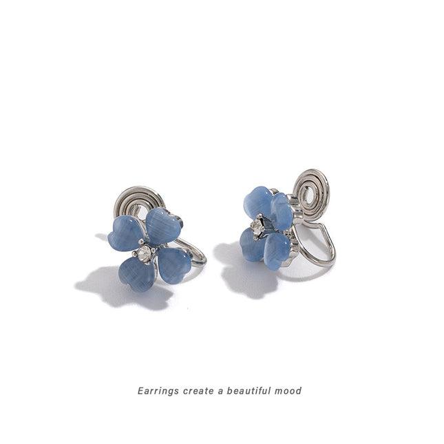 Lucky Blue Four-Leaf Clover Earrings for Women, Exquisite and Compact, Versatile for Daily Use, New Popular Mosquito Coil Disc Ear Clips Without Pierced Ears