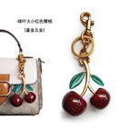 MH / Green leaf size red cherry (gilded hardware)