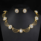 18k gold necklace + earrings gold and white