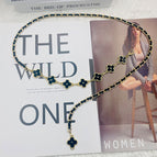 Gold chain [black leather] [four-leaf clover black and white on both sides]]